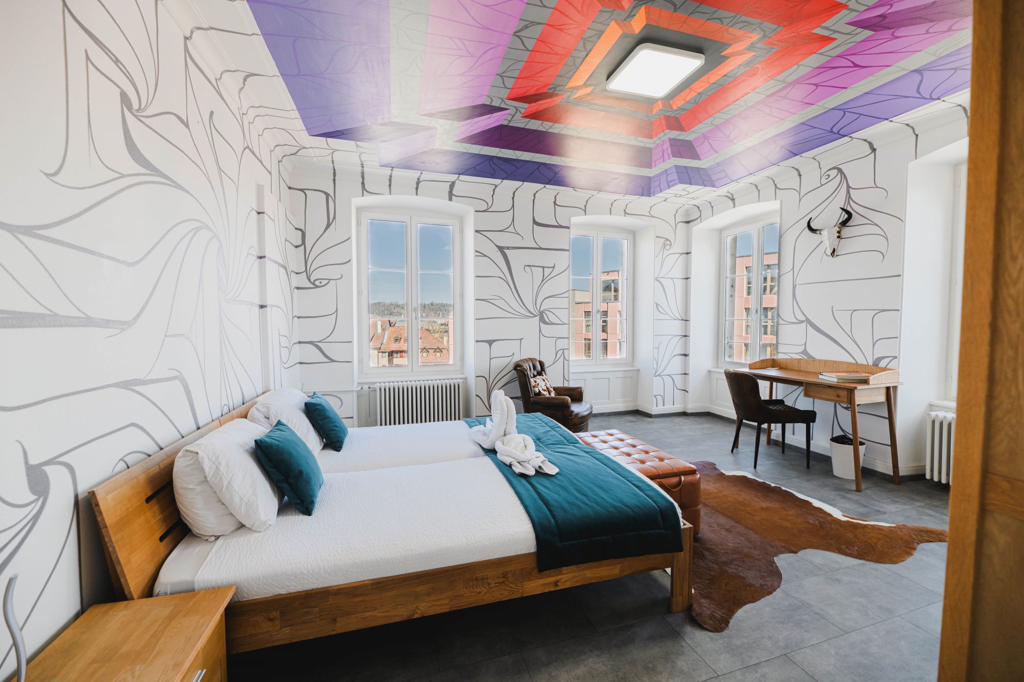 L'Astro, une des chambres de l'hôtel Stay.Swiss revisitées dans le cadre du projet bruntrutain.